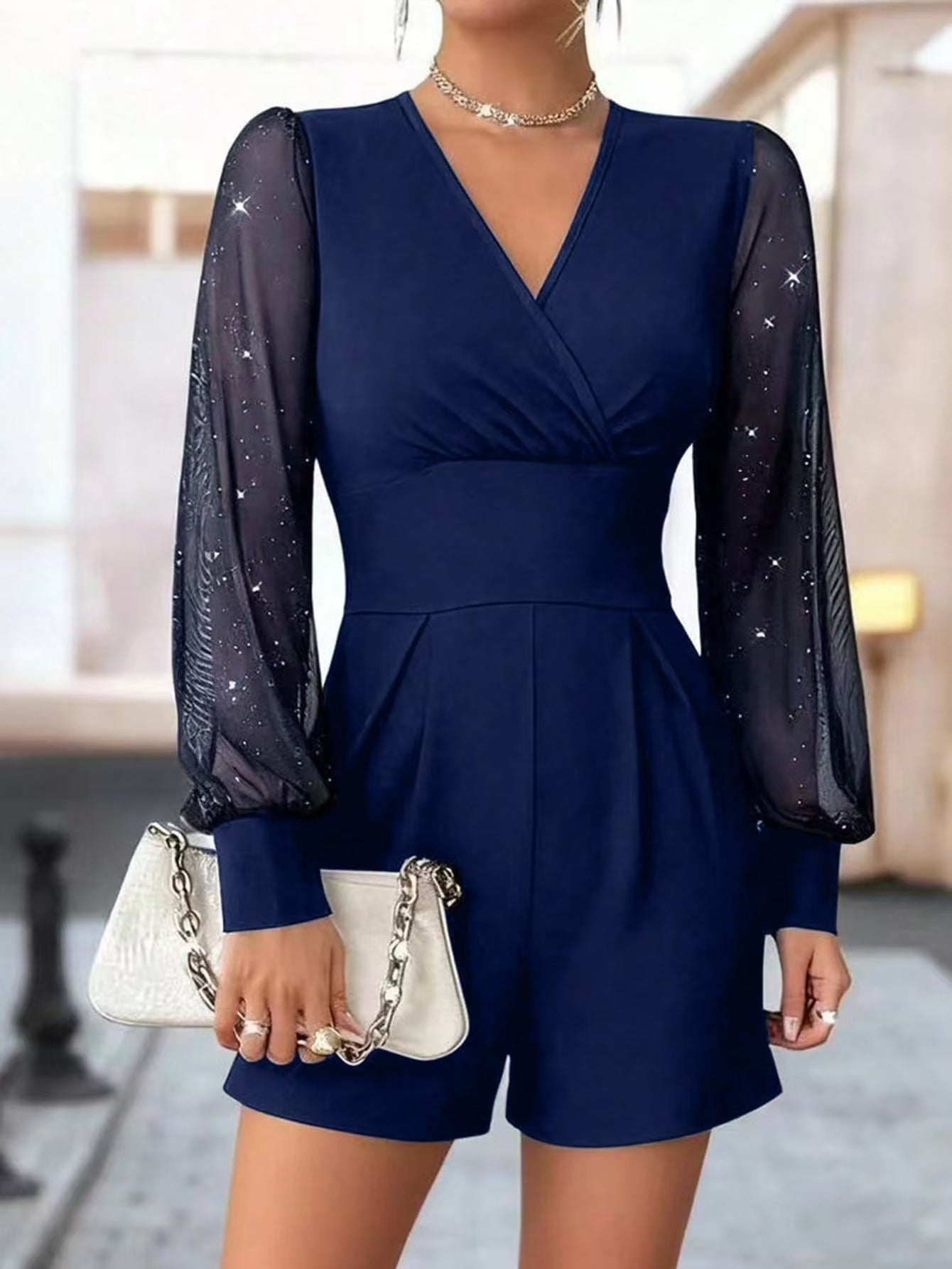 Damen eleganter Jumpsuit mit transparenten Puffärmeln und V-Ausschnitt