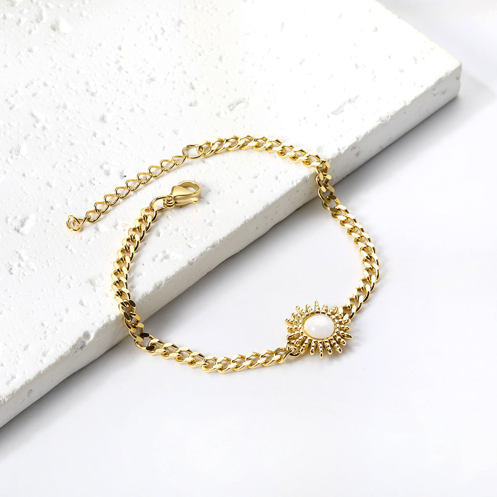 Damen Edelstahl Armkettchen mit goldplattiertem Sonnenanhänger Shop Nory