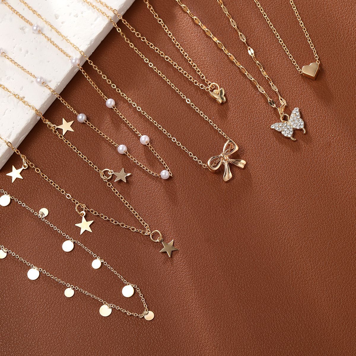 Damen Halskette Set mit funkelnden Anhängern und zarten Designs Shop Nory