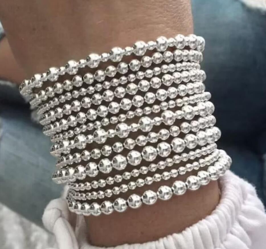 Damen Armband-Set mit funkelnden Perlen und eleganten Details Shop Nory