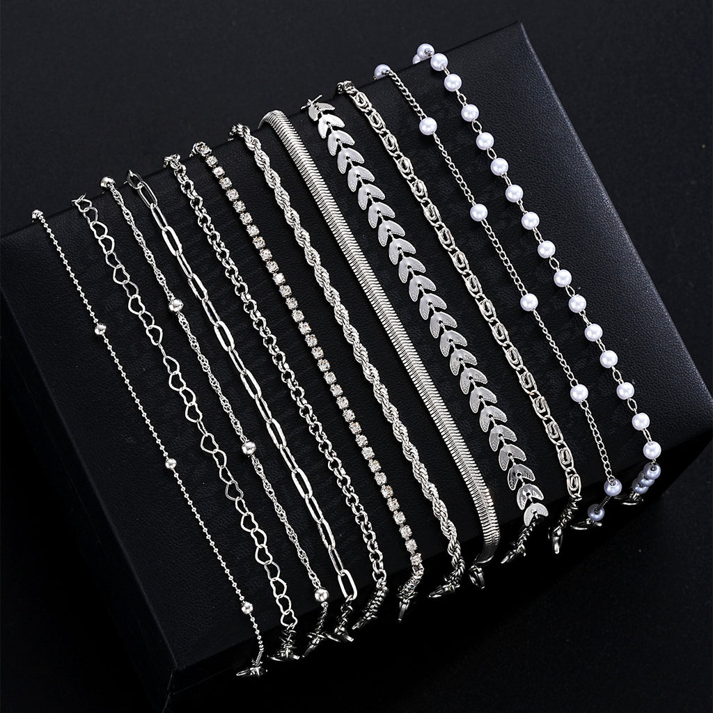 Damen Armband-Set mit filigranen Designs und funkelnden Zirkonia Shop Nory