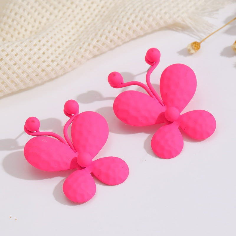 Damen Ohrclips mit kunstvollem Blumenmuster Shop Nory