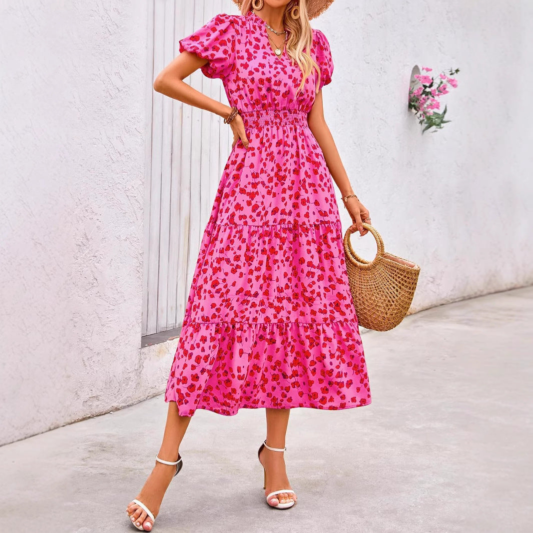 Damen Maxi-Kleid mit floralen Mustern und rüschendem Saum Shopnory