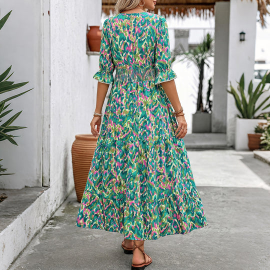 Damen Maxikleid mit buntem Aquarell-Print, V-Ausschnitt, tailliertem Smok-Bund und Stufenrock Shop Nory