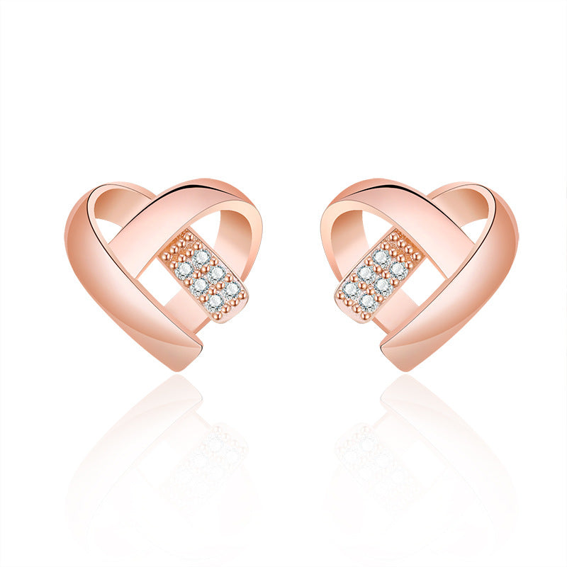 Damen Ohrstecker in Herzform mit funkelnden Zirkonia Shop Nory