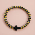 Damenarmband mit Kreuzmotiv und glanzvollen Perlen Shop Nory