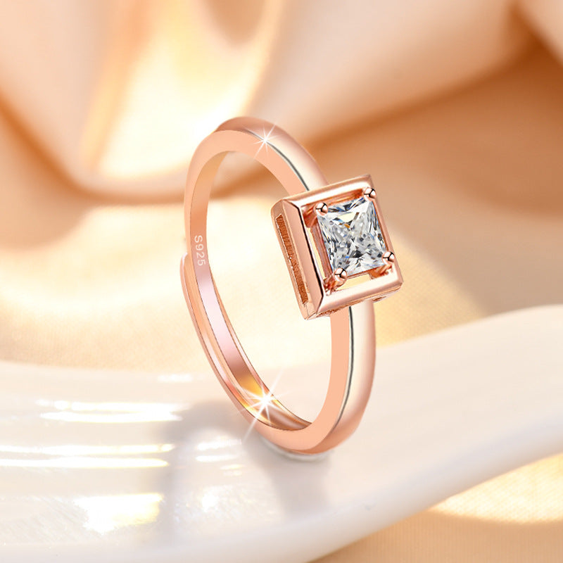 Damen eleganter Verlobungsring mit quadratischem Zirkonia-Besatz Shop Nory