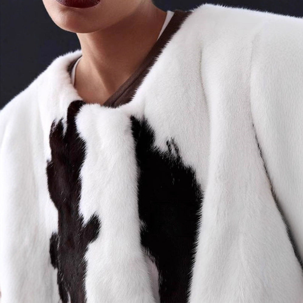 Damen Kurzmantel aus Kunstpelz mit kastiger Silhouette und Kuhfleckenmuster Shop Nory
