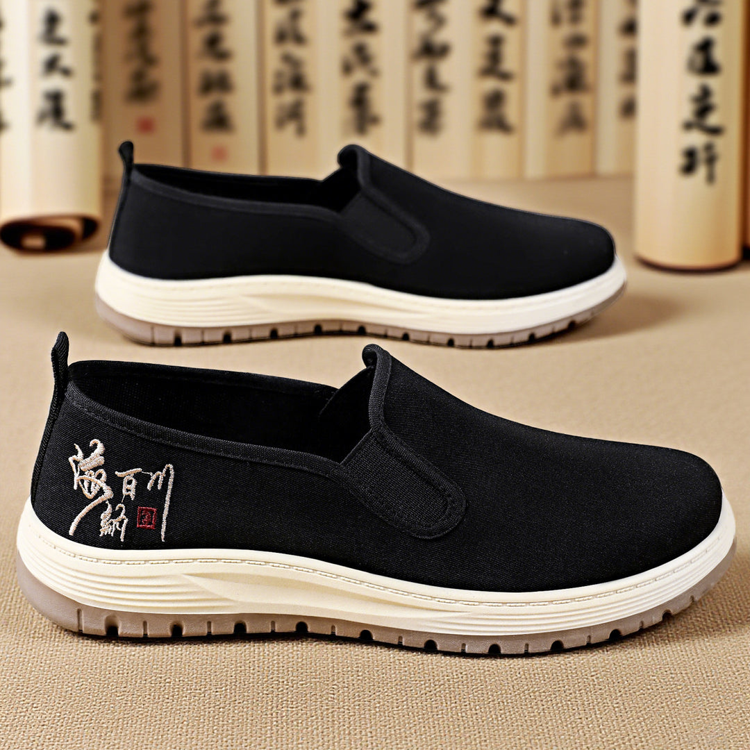 Herren nan nahtloser Canvas-Slip-On mit elastischem Einstieg, besticktem Fersenmotiv und rutschfester EVA-Laufsohle Shop Nory
