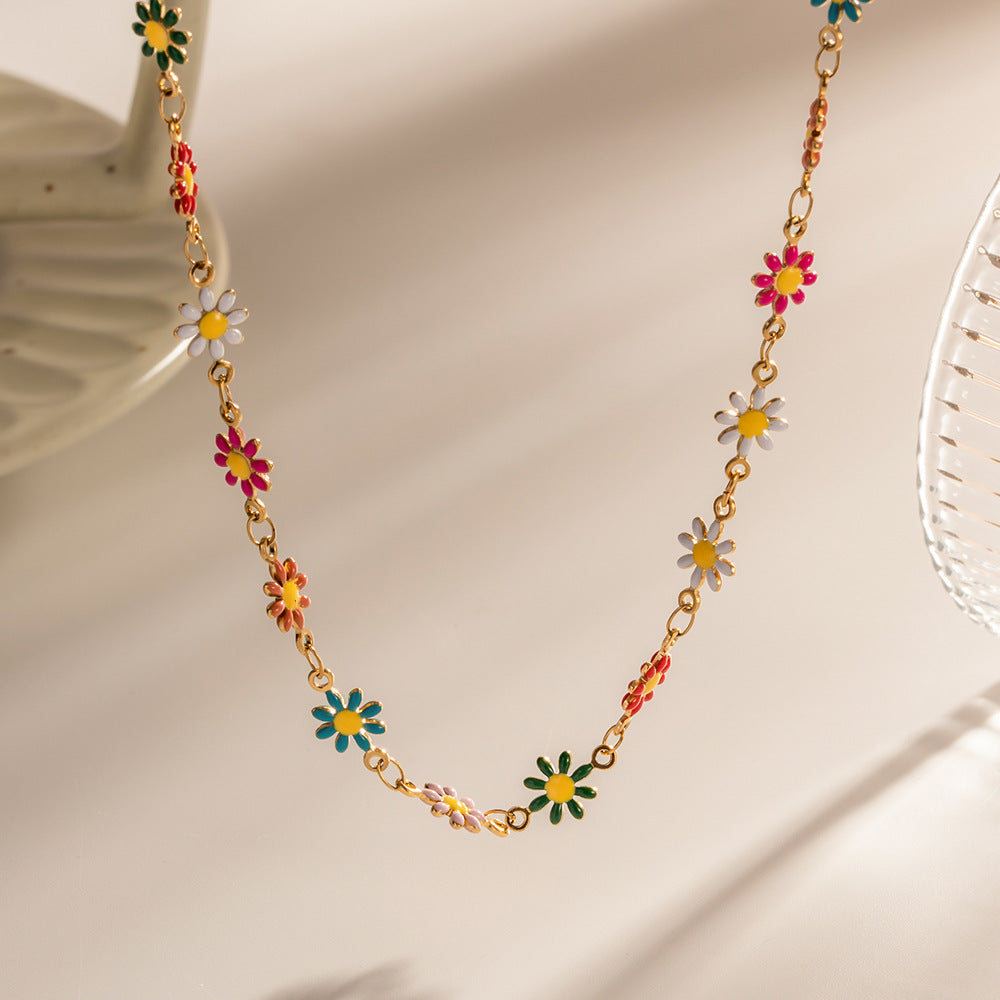 Damen Halskette mit bunten Blumenmotiven und goldfarbener Kettenverarbeitung Shop Nory