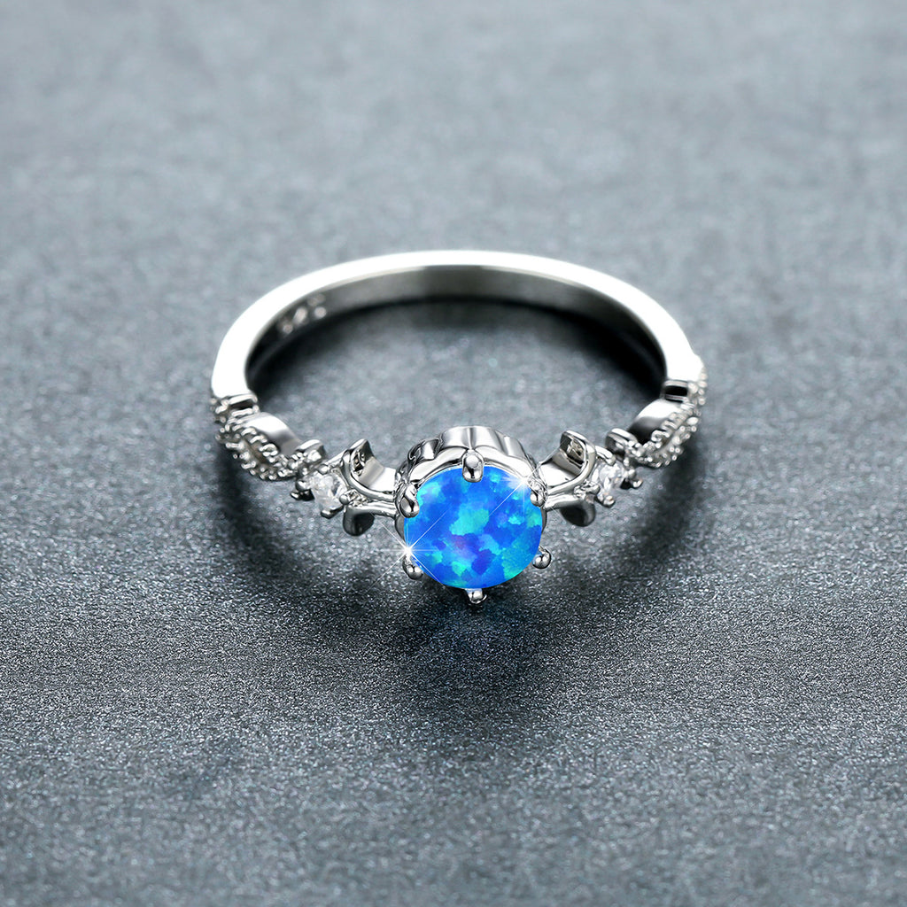 Damen Schmuckring mit opalisiertem Stein und filigranem Design Shop Nory