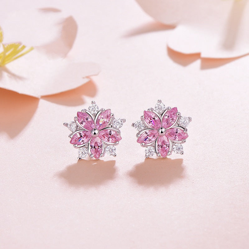 Damen Ohrringe im floralen Design mit funkelnden Zirkonia Shop Nory