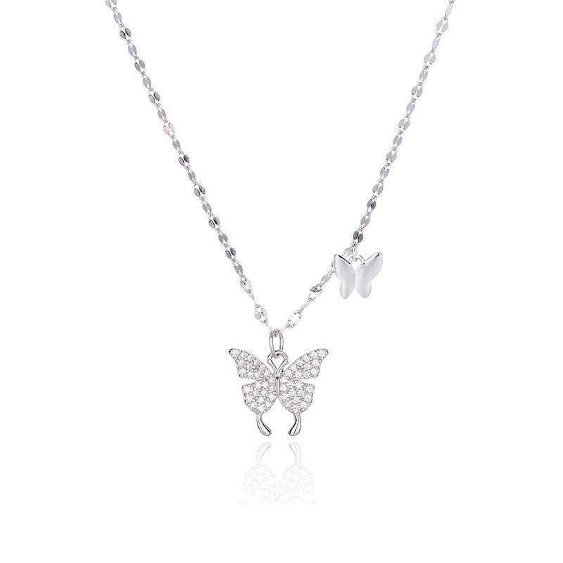 Damen Halskette mit filigranem Schmetterlingsdesign und funkelnden Akzenten Shop Nory