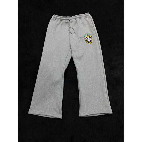Damen weite Jogginghose mit elastischem Bund, Tunnelzug und gesticktem Emblem Shop Nory