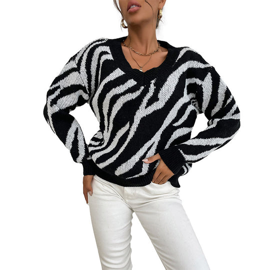 Damen Oversize V-Ausschnitt Pullover mit Zebra-Jacquard und gerippten Bündchen Shop Nory