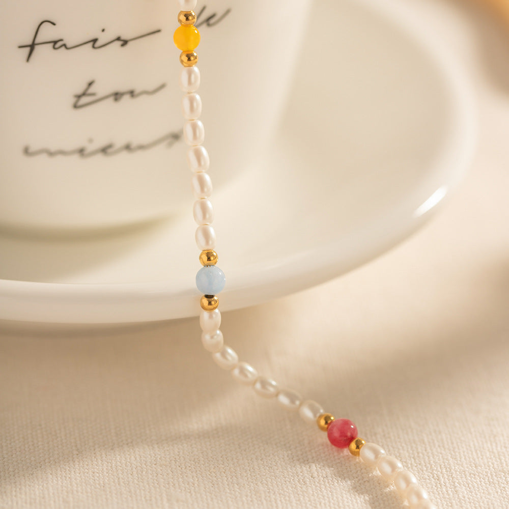 Damen Armband mit eleganten Perlen und bunten Steinakzenten Shop Nory