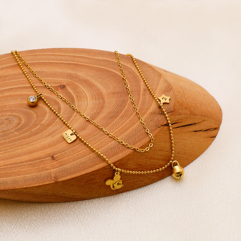 Damen Goldene Doppel-Kette mit verspielten Charms Shop Nory