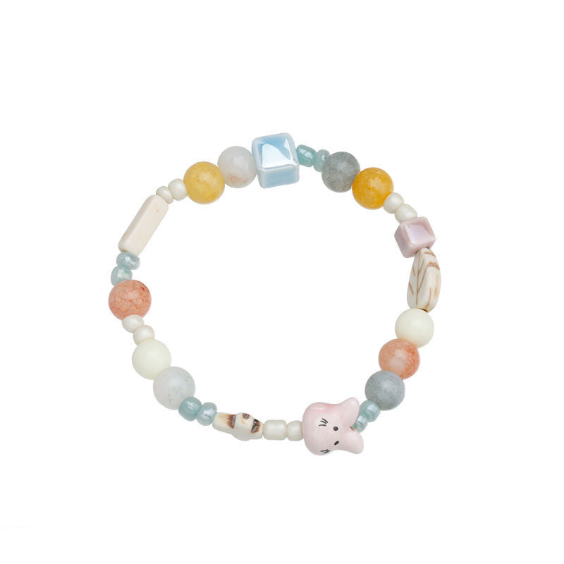 Damen handgemachtes Armband mit einzigartigen Tieranhängern Shop Nory