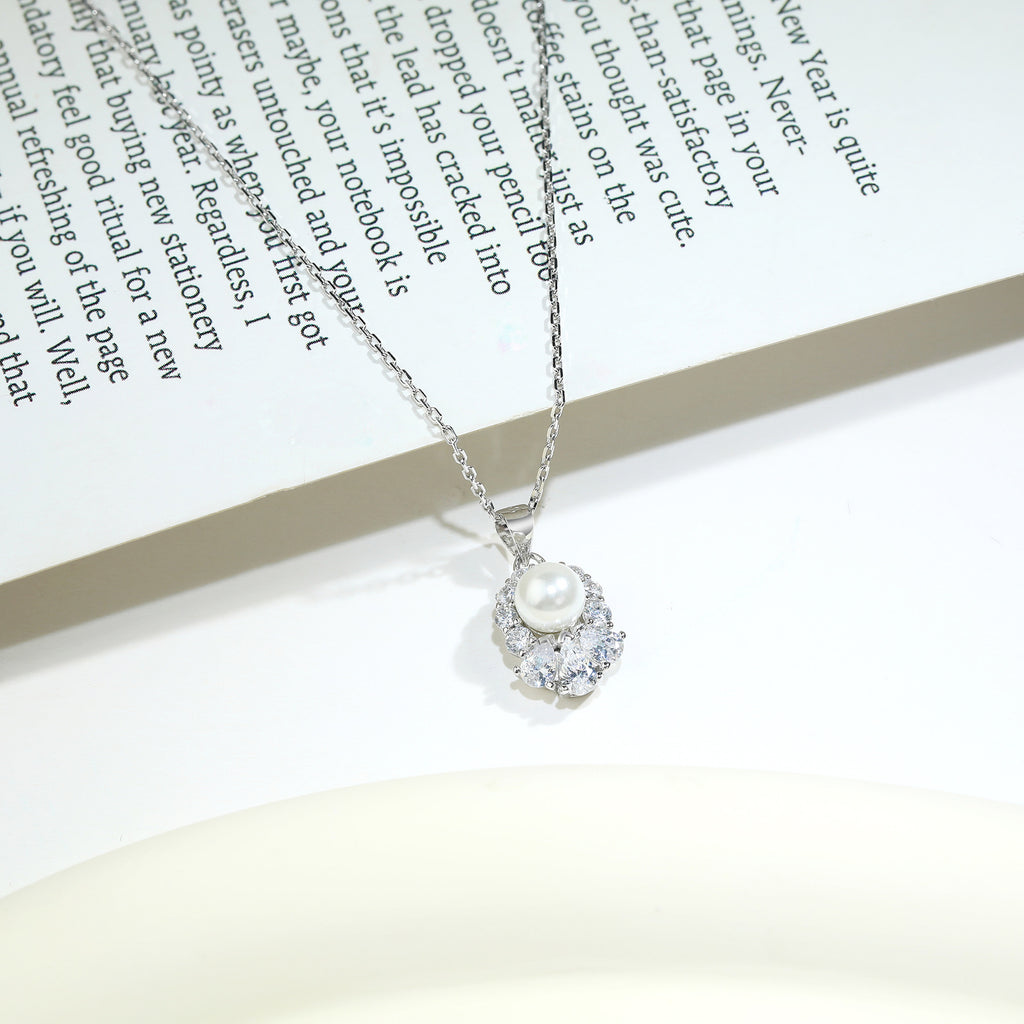 Damen Halskette mit elegantem Perlenanhänger und funkelndem Zirkonia-Besatz Shop Nory