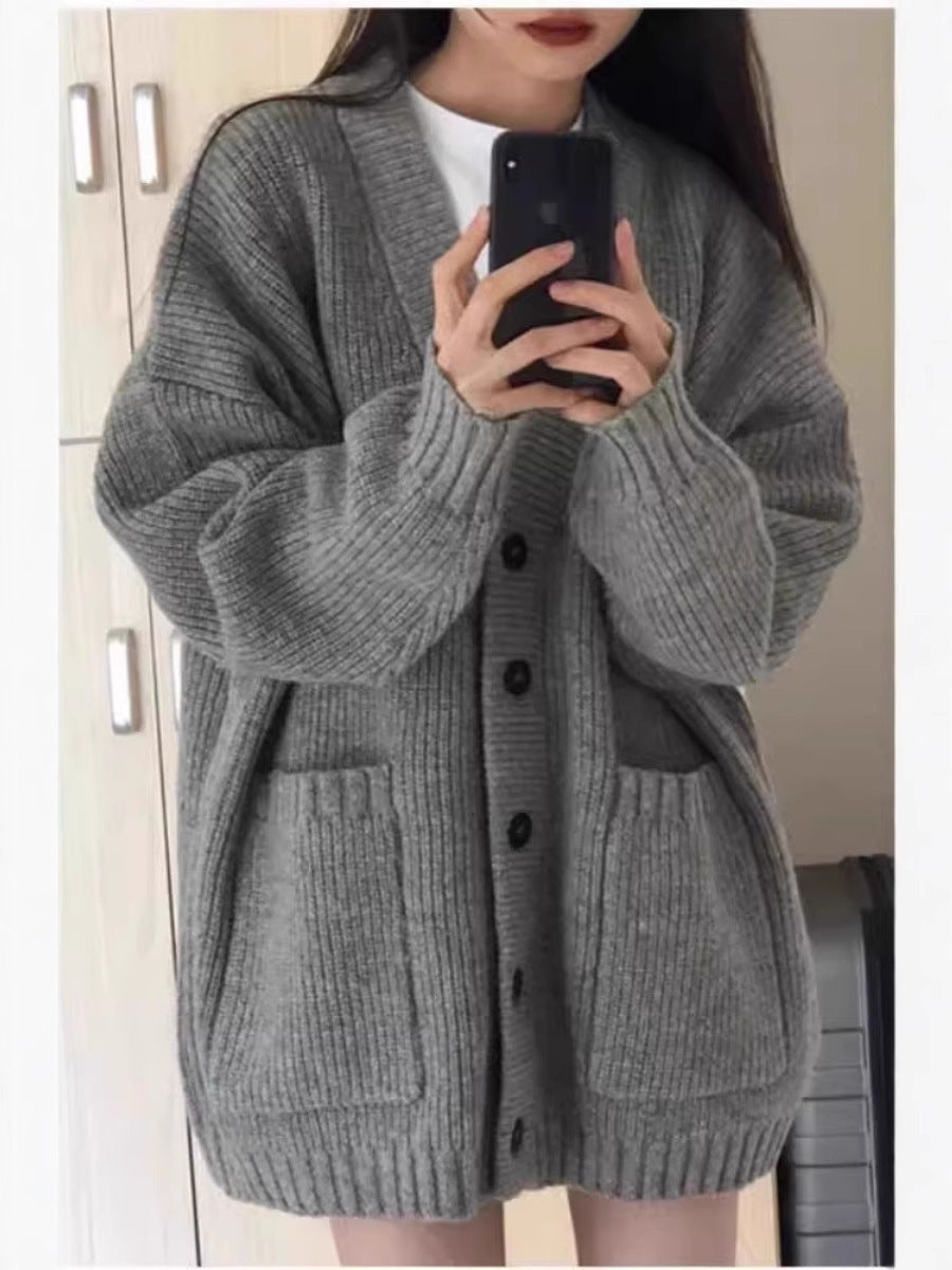 Damen Oversize Strickcardigan mit aufgesetzten Taschen und durchgehender Knopfleiste Shop Nory