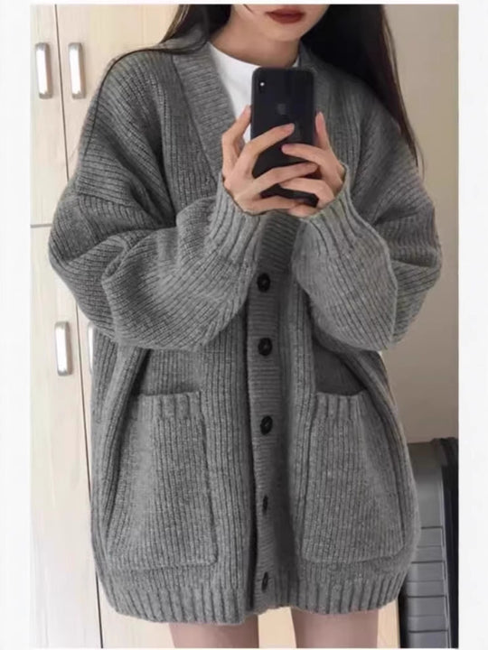 Damen Oversize Strickcardigan mit aufgesetzten Taschen und durchgehender Knopfleiste Shop Nory