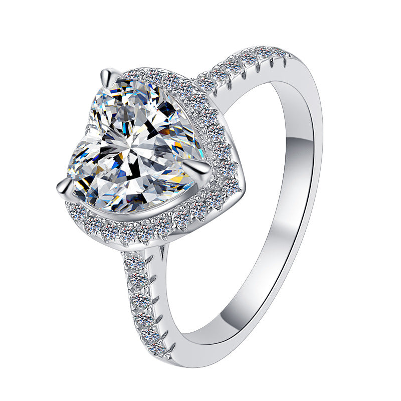 Damen-Verlobungsring mit herzförmigem Hauptstein und funkelnden Zirkonia Shop Nory