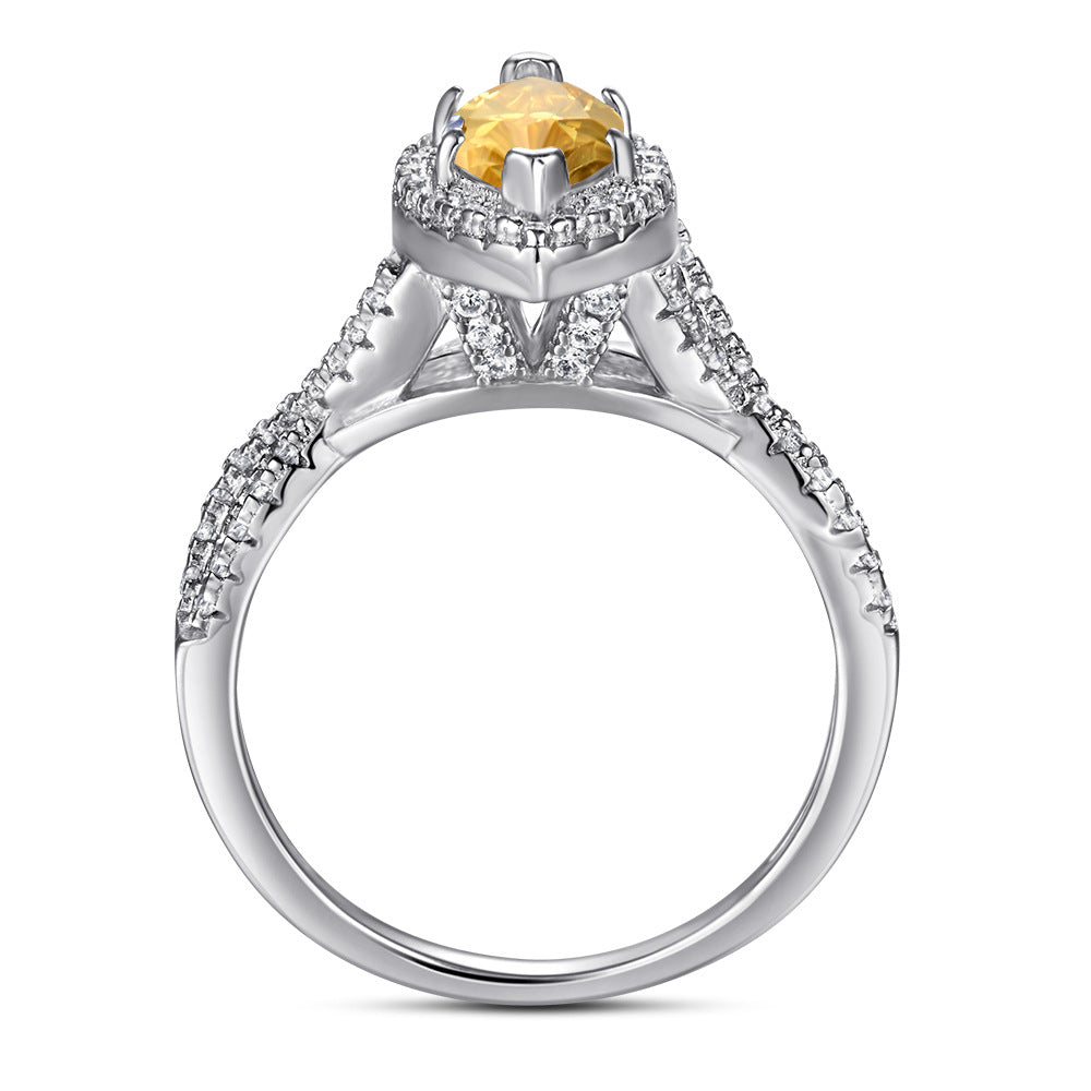 Damen eleganter Verlobungsring mit ovalem Hauptstein und kunstvollem Zirkonia-Besatz Shop Nory