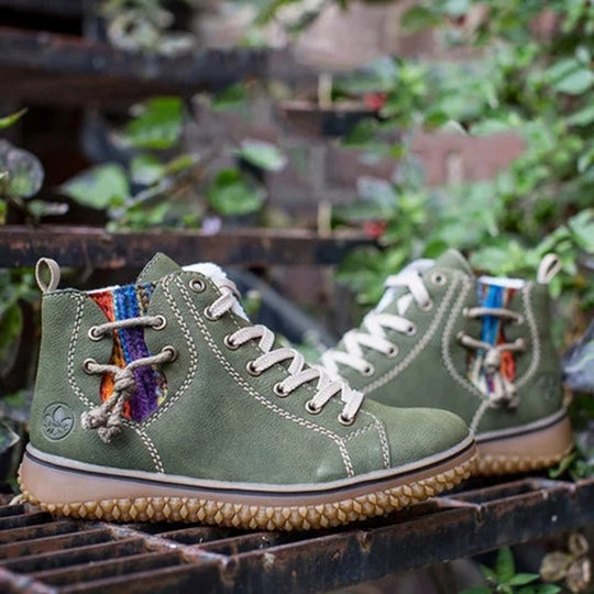 Damen High-Top Sneaker-Boot mit seitlichem Reißverschluss, dekorativem Knöchelriemen und profilierter Gummisohle Shop Nory