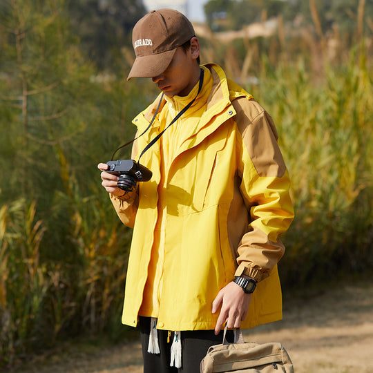 Damen zweilagige wasserabweisende Outdoorjacke mit Kapuze, Taillenregulierung und Kontrastbesätzen Shop Nory