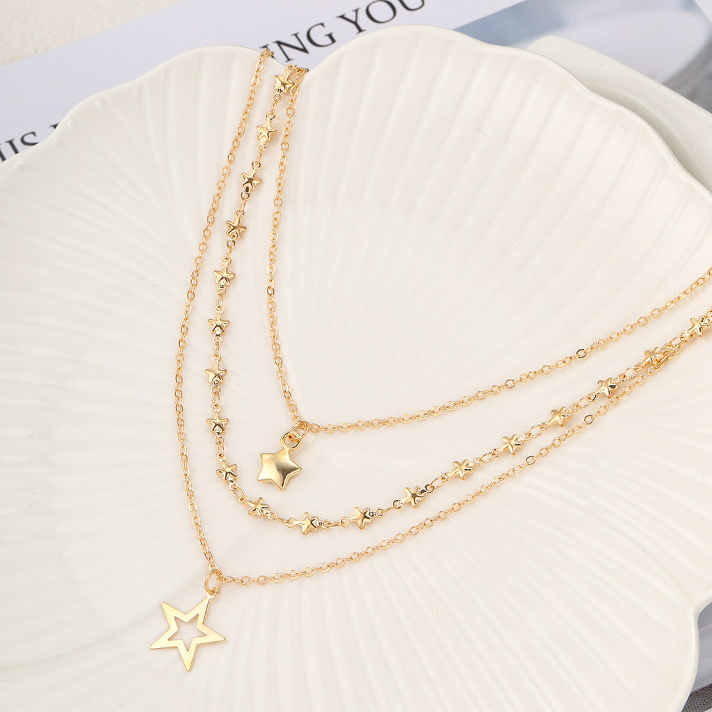Damen mehrlagige Halskette mit Sternanhänger und eleganten Perlenakzenten Shop Nory