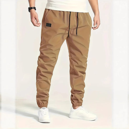 Herren Technische Jogginghose im Tapered‑Utility‑Stil mit elastischem Bund & Knöchelbündchen Shop Nory