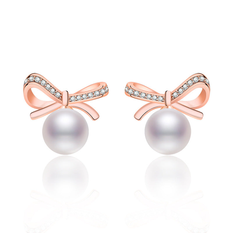 Damen Ohrringe mit Perlendesign und funkelnden Zirkonia Shop Nory