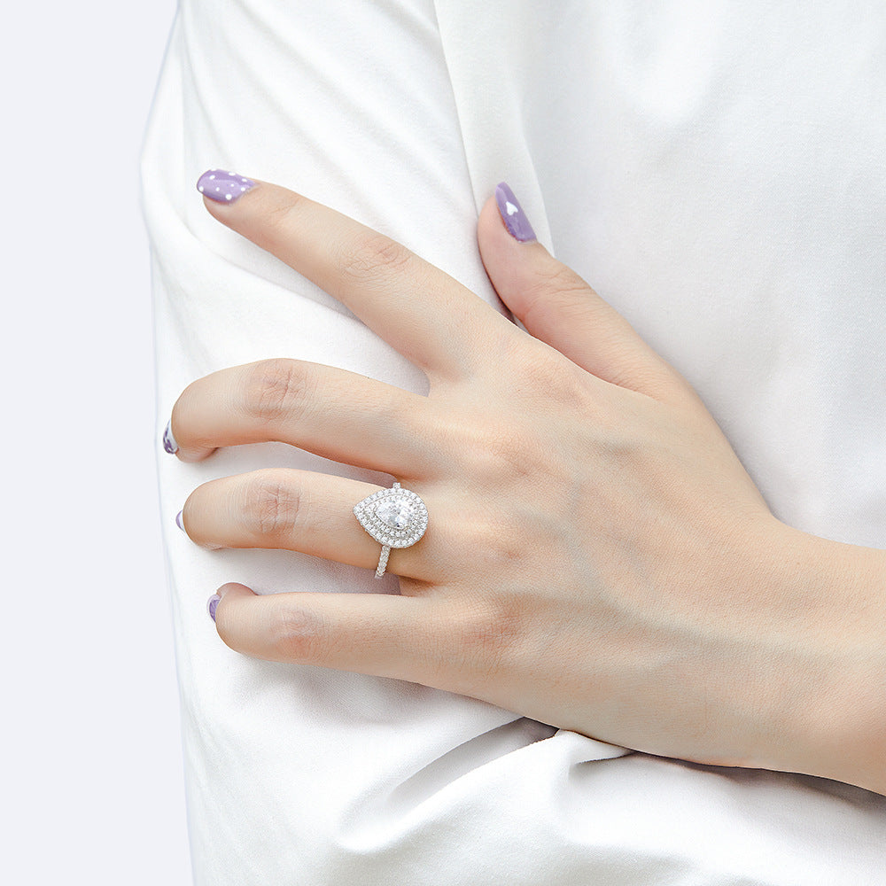 Damen eleganter Tropfenring mit funkelndem Zirkonia-Besatz Shop Nory