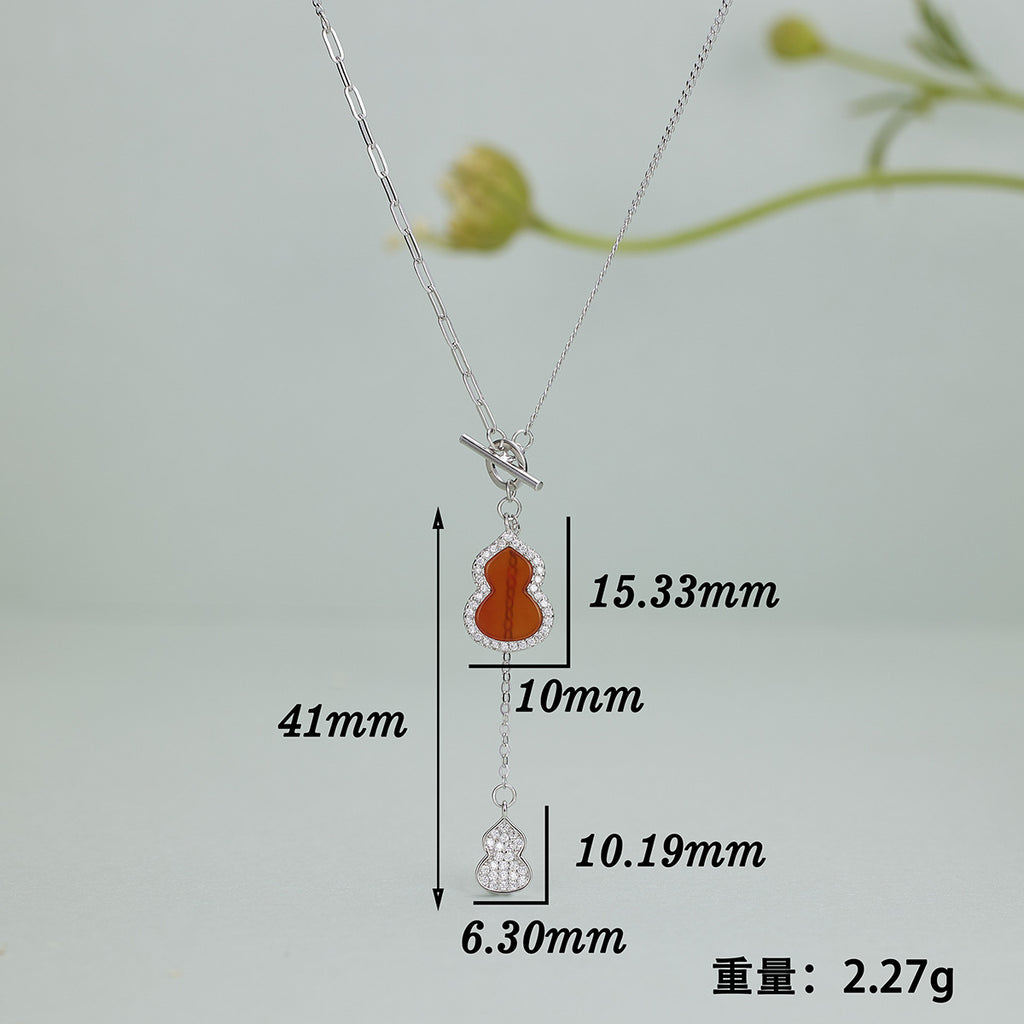 Damen Halskette mit doppelt gestaltetem Anhänger aus Halbedelstein und funkelnden Zirkonia Shop Nory