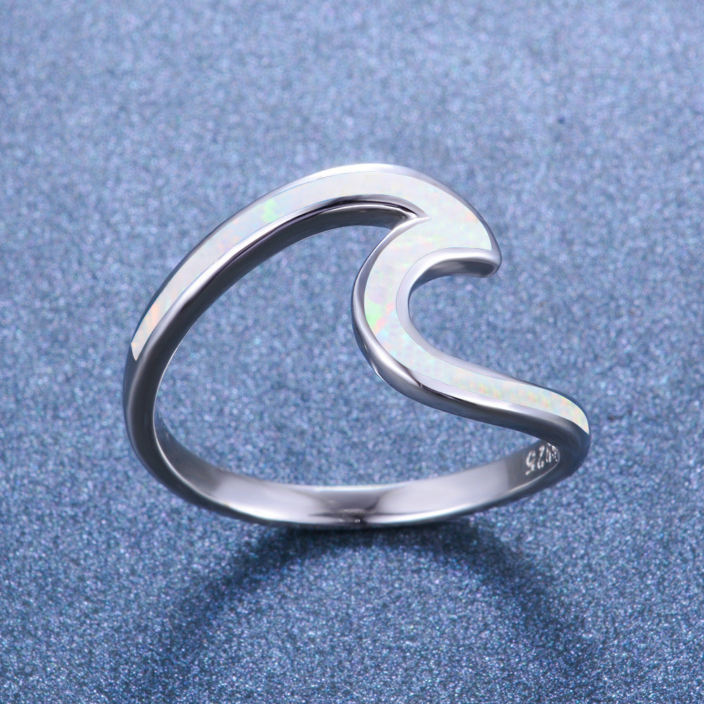 Damen Ring mit modernem, geschwungenem Design und opalisierten Akzenten Shop Nory