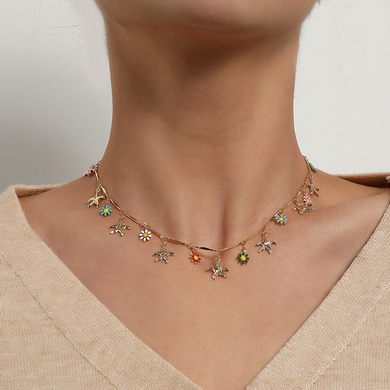 Damen Halskette mit farbenfrohen Blumen- und Vogelanhängern Shop Nory