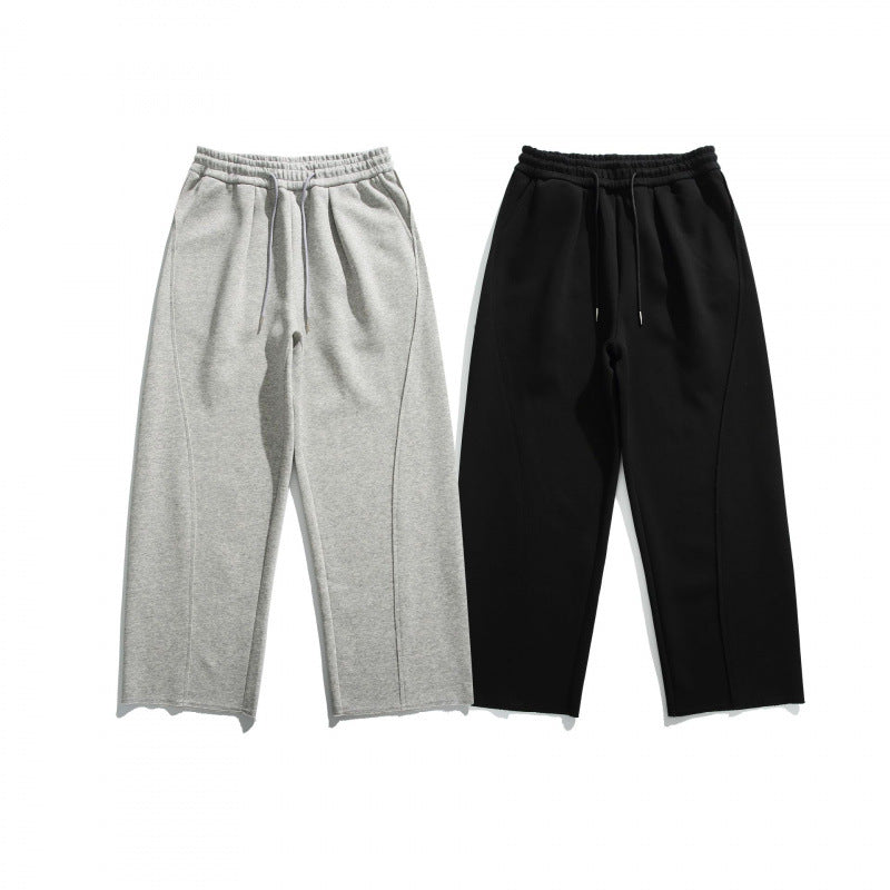 Unisex Weite Baumwoll-Fleece-Jogginghose mit Tunnelzug, Dekorativen Vordernähten und Raw-Saum Shop Nory