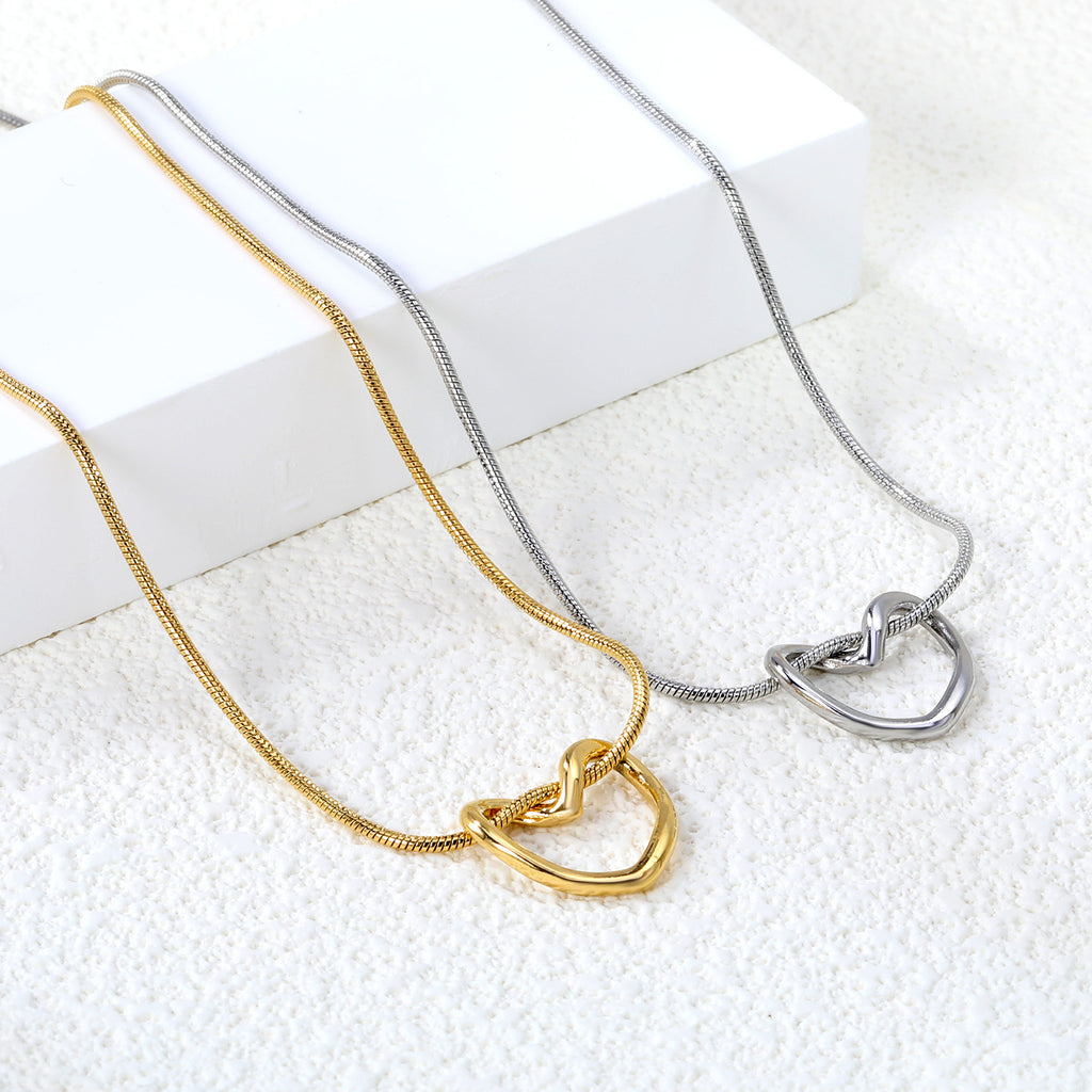 Damen Halskette mit herzförmigem Anhänger und hochwertiger Goldoberfläche Shop Nory
