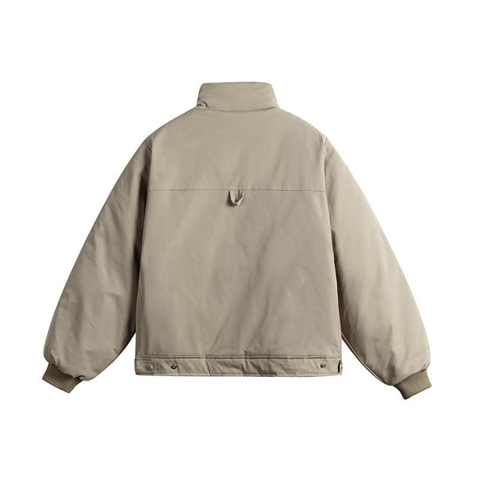 Unisex Kurz geschnittene gesteppte Jacke mit Stehkragen und ergonomischen Seiteneinsätzen Shop Nory