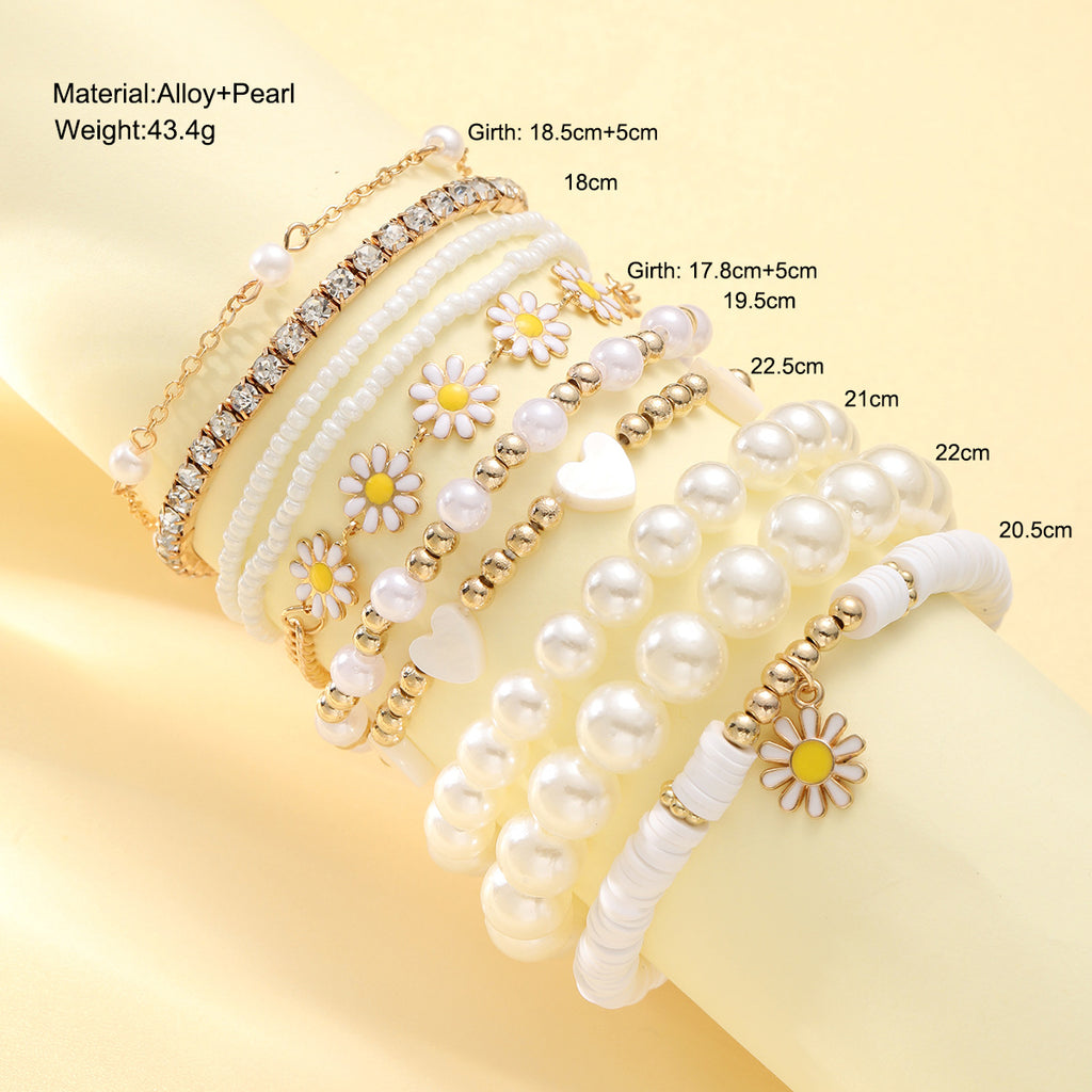 Damen Armband-Set mit stilvollen Perlen und bunten Blumenanhängern Shop Nory