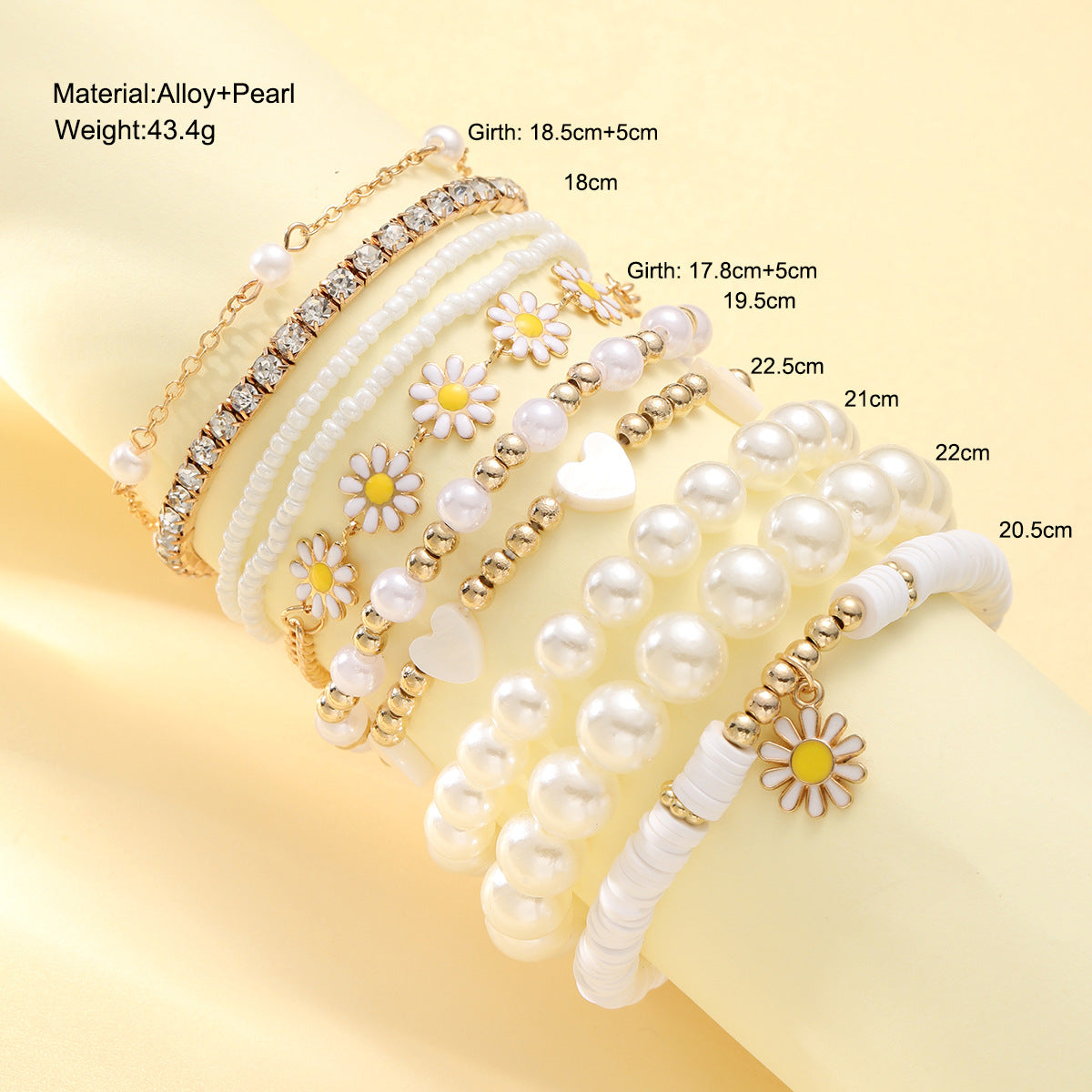 Damen Armband-Set mit stilvollen Perlen und bunten Blumenanhängern Shop Nory