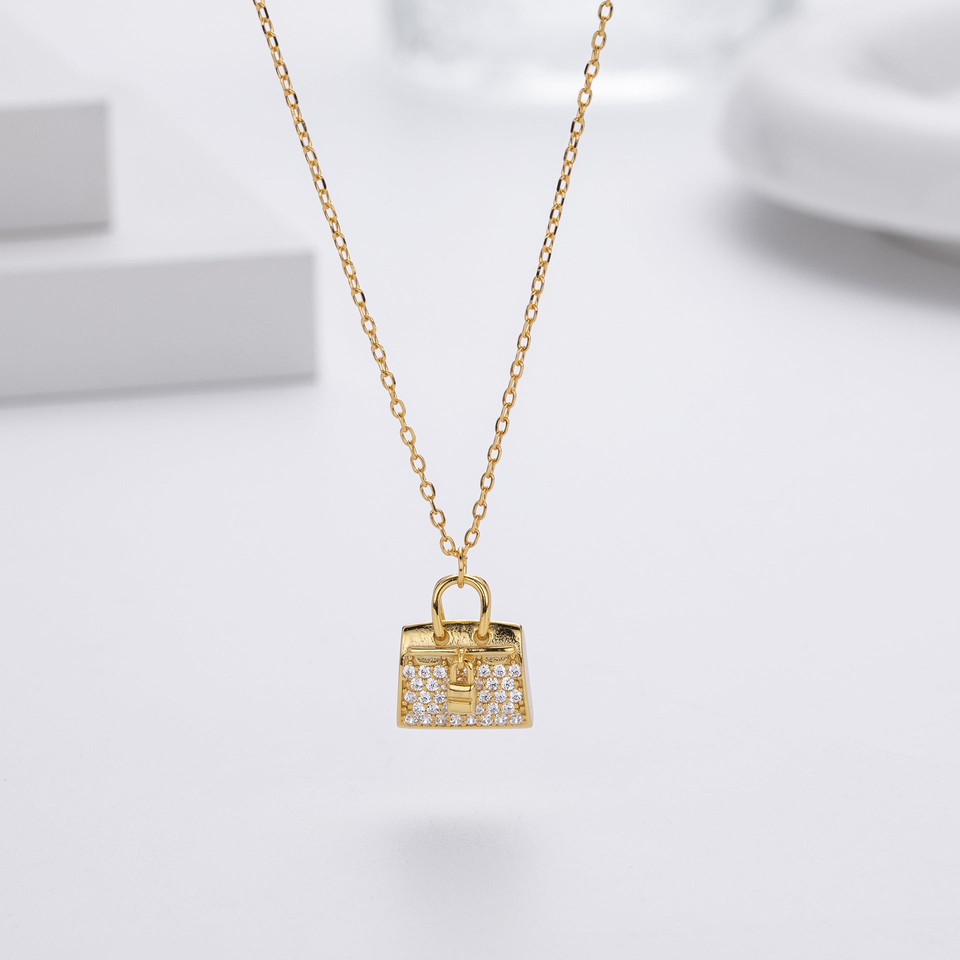 Damen Halskette mit einzigartigem Handtaschenanhänger aus hochwertigem 925 Sterling Silber und funkelnden Zirkonia Shop Nory