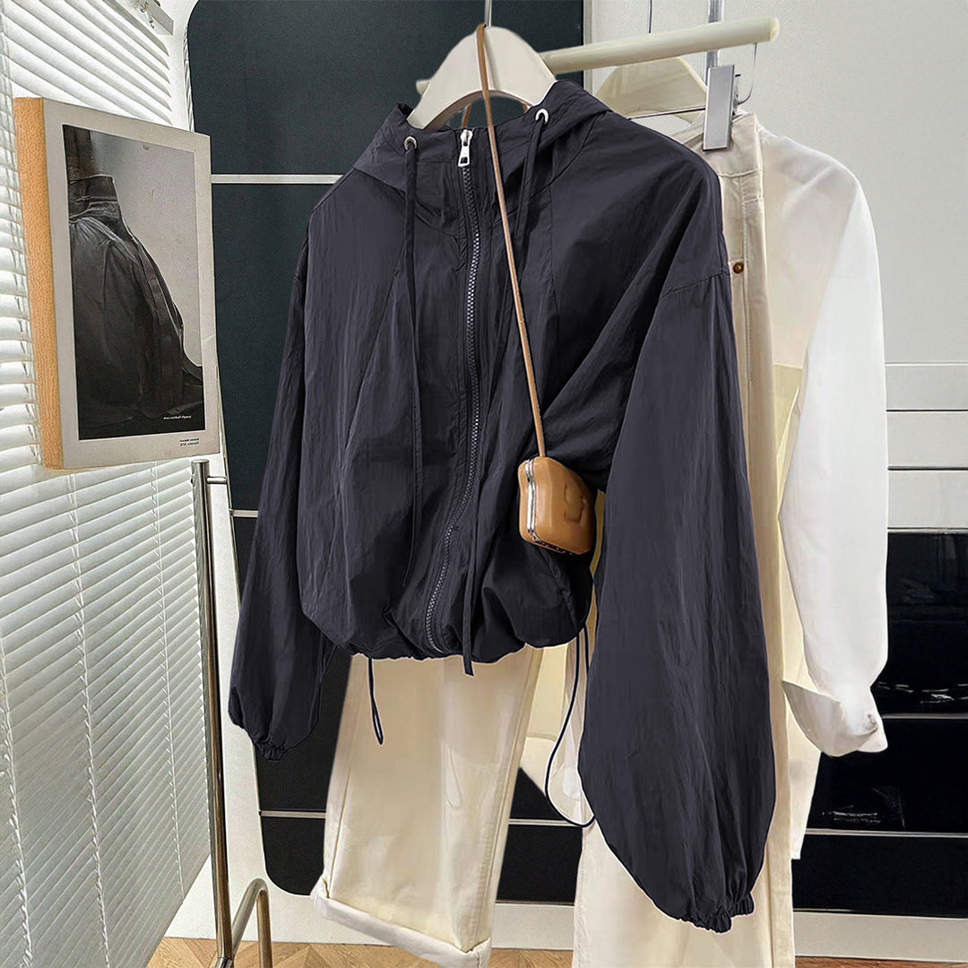 Damen nan leichtgewichtige Kapuzen-Übergangsjacke mit Tunnelzugbündchen und Ballonärmeln Shop Nory