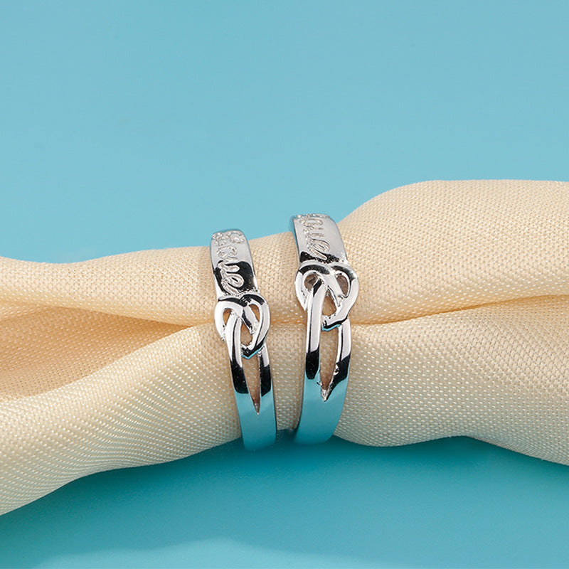 Damenring mit Herz-Knoten-Design und eingravierten Liebesbotschaften Shop Nory