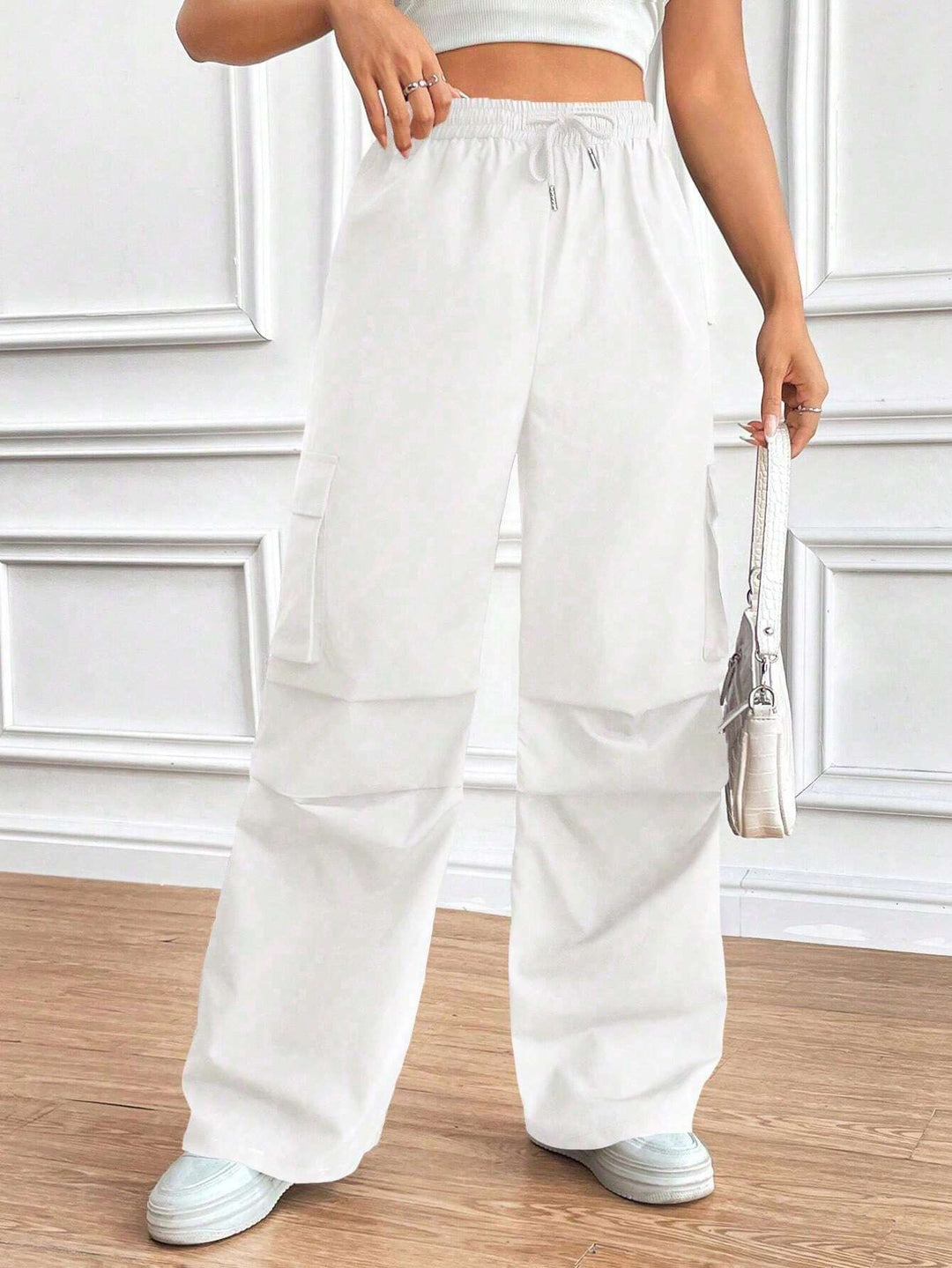 Damen Weite High‑Waist Cargo‑Hose mit Elastikbund und großen Klappentaschen Shop Nory