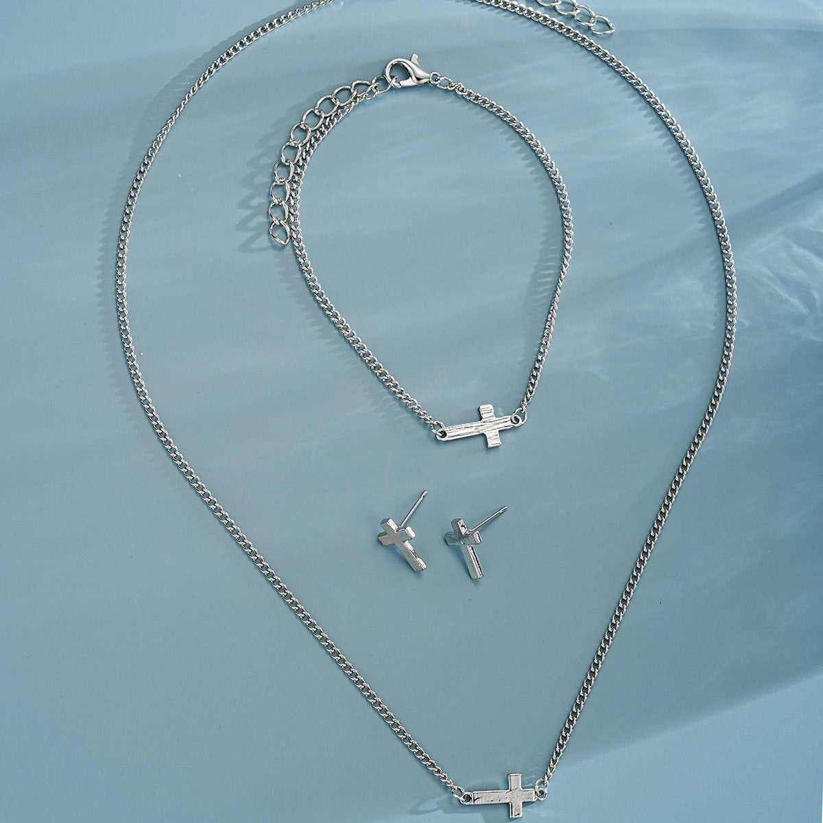 Damen Schmuckset mit kreuzförmigem Design und feinen Details Shop Nory
