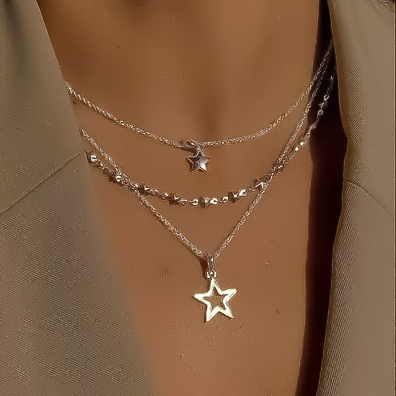 Damen mehrlagige Halskette mit Sternanhänger und eleganten Perlenakzenten Shop Nory