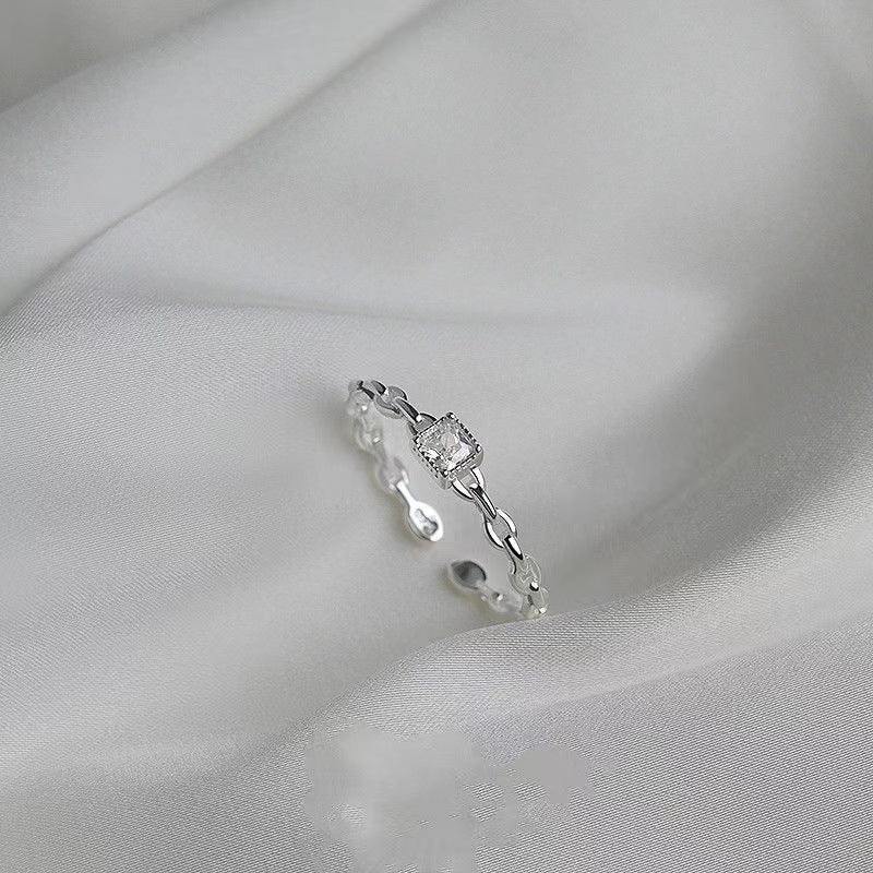 Damen offener Ring mit elegantem Kettendesign und funkelndem Zirkonia Shop Nory