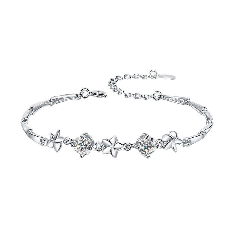 Damenarmband mit floralem Design und funkelnden Kristallen Shop Nory
