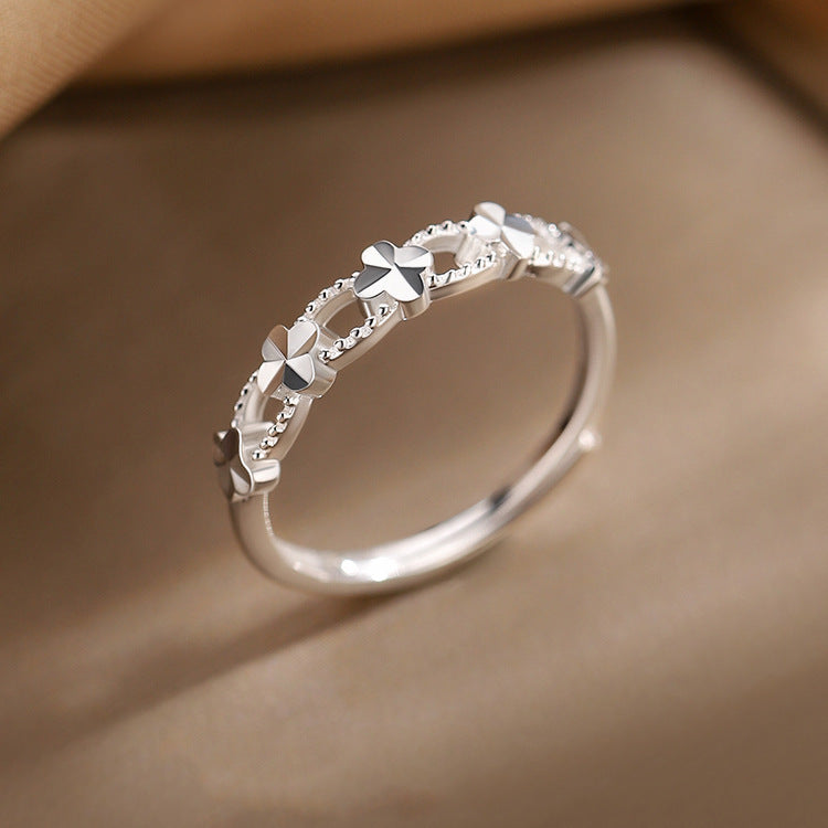 Damen Zierlicher Ring mit floralem Design und funkelnden Akzenten Shop Nory